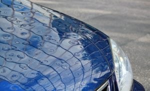 Hail damage on a car bonnet