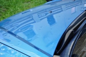 Hail damage on a car bonnet